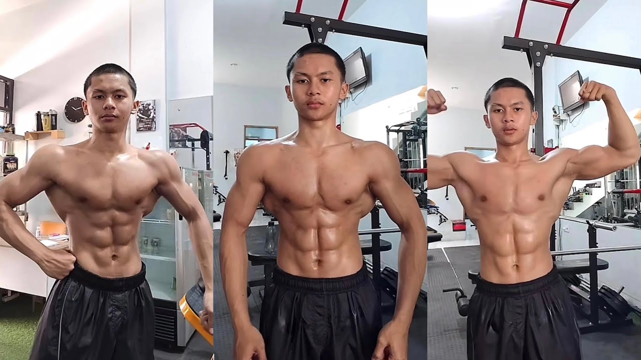 Atlet binaraga muda latihan otot kekar di gym