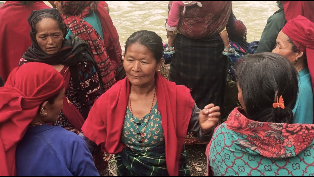 Group meal of villagers at the Takasera, Rukum East.