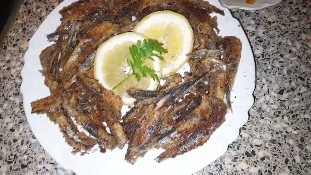 الحوت مقرمش  مع عصير  الحامض مغريبة في إسبانية  🍋🐟#إكسبلور #2026