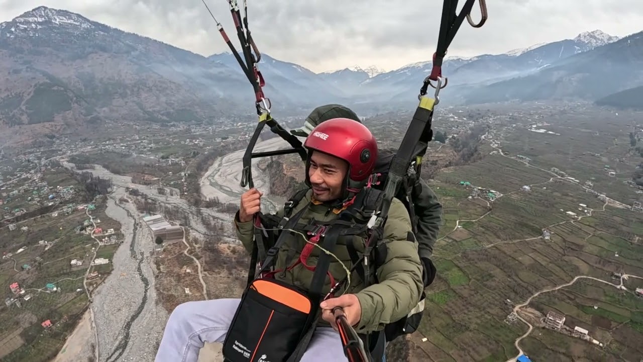 Paragliding at Kullu-Manali, Himachal Pradesh. Flying from Highest point of the mountain and landing