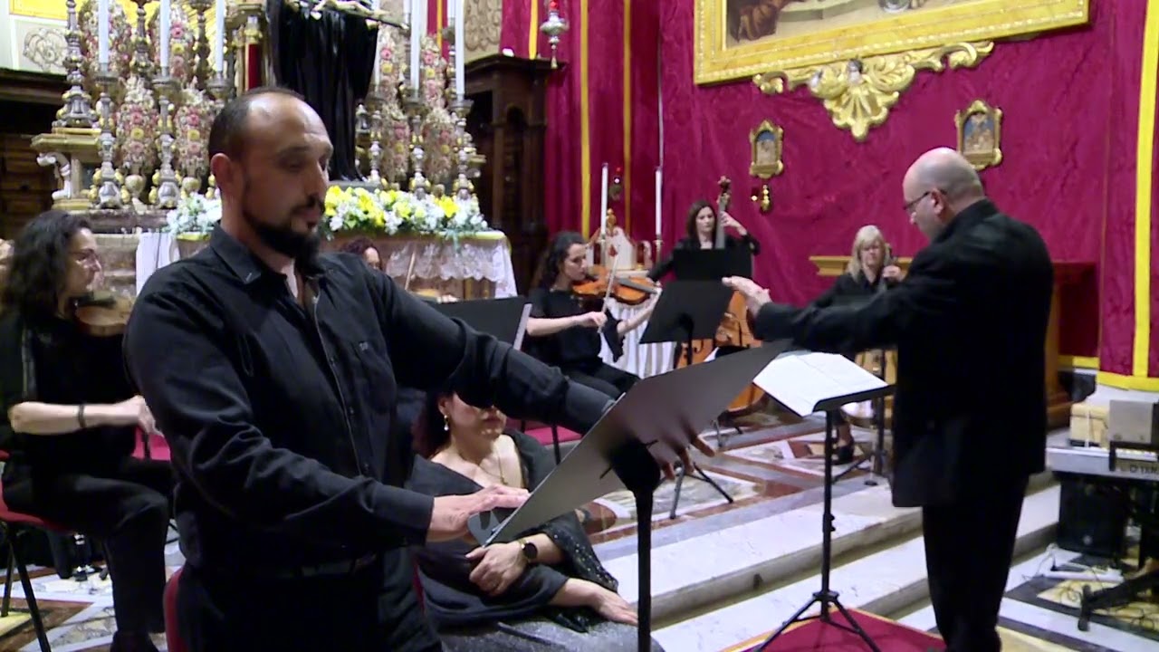 Confitemini Domino miktuba Min Mro.Antoine Mercieca u ikanta Il-Baritono Louis Cassar