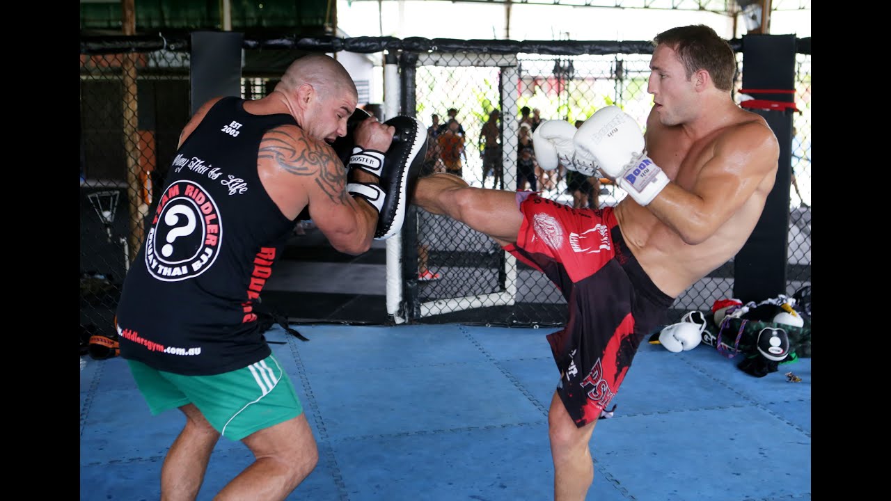 Brad "Quake" Riddell Hitting Pads for Global Fighting Championship