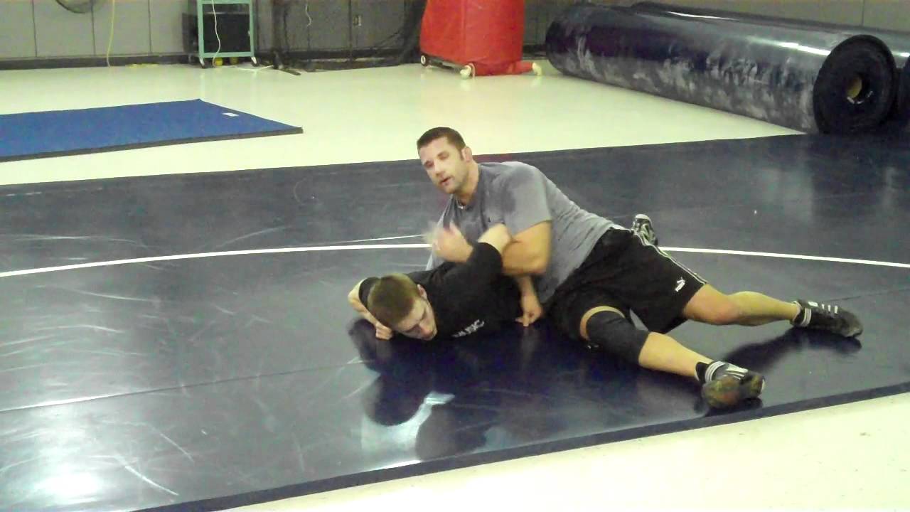 Arm Bar or Chicken Wing Wrestling Move