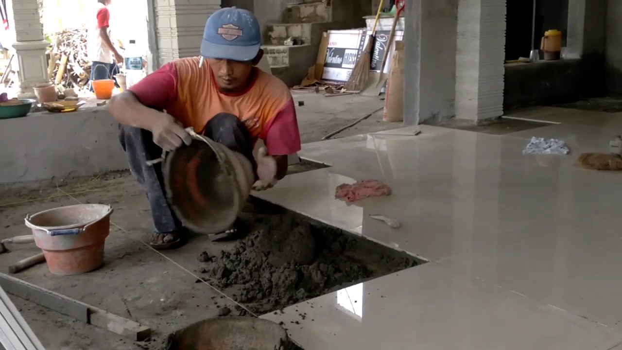 Teknik memasang granito 60x60 cepat dengan alat seadanya