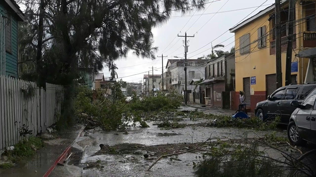 Residents clear up after Hurricane Lisa lashes Belize | AFP