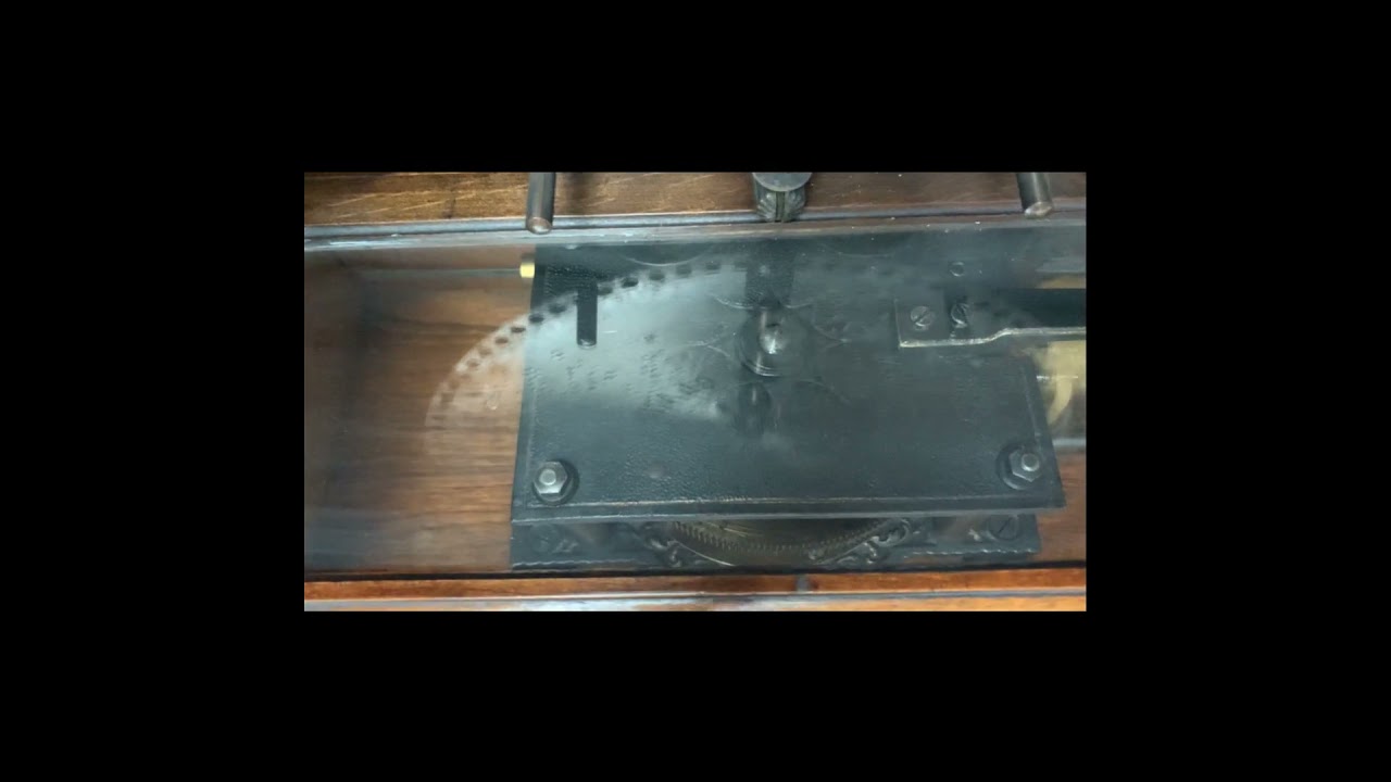 An Upright Coin-in-the-slot 15 1/2