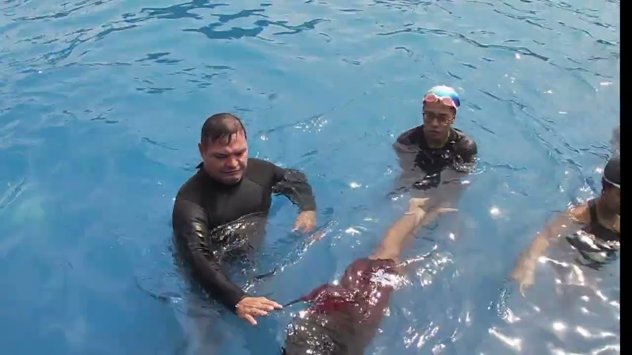 Salida en estilo espalda y patada de delfin