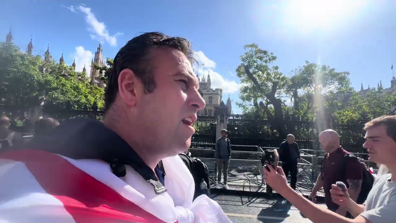 Protesters climb Statues, Westminster Bridge London, Tommy Robinson March- 2025-London 