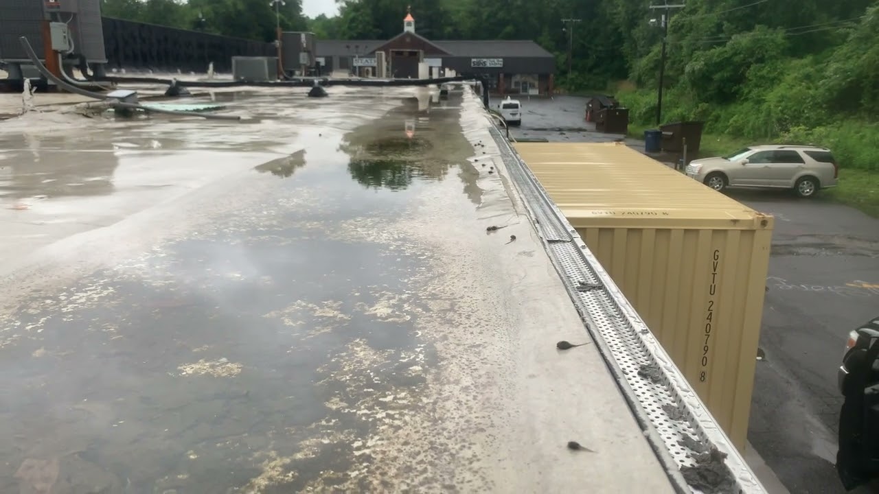 Installing Gutters Too High On Your Flat Roofing System Can Cause Water Retention.