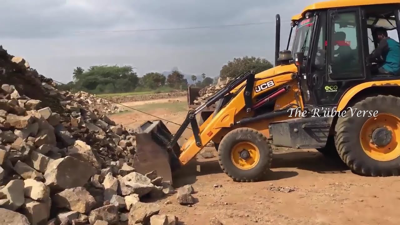 JCB 3dx super loading stone into a dump truck #JCB