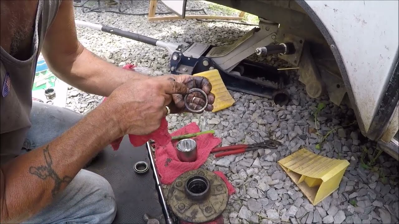 Inspecting cleaning Repacking My Scamp wheel bearing.