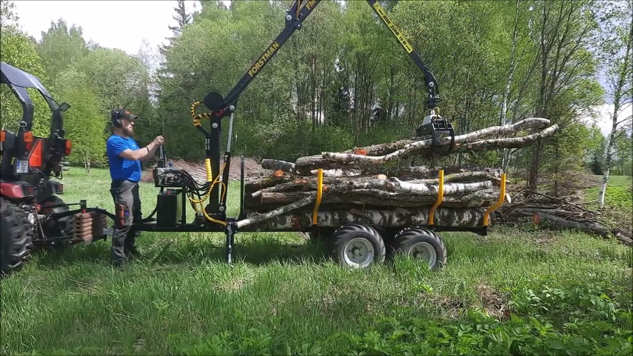 Small timber trailer in action. Forstman FM40