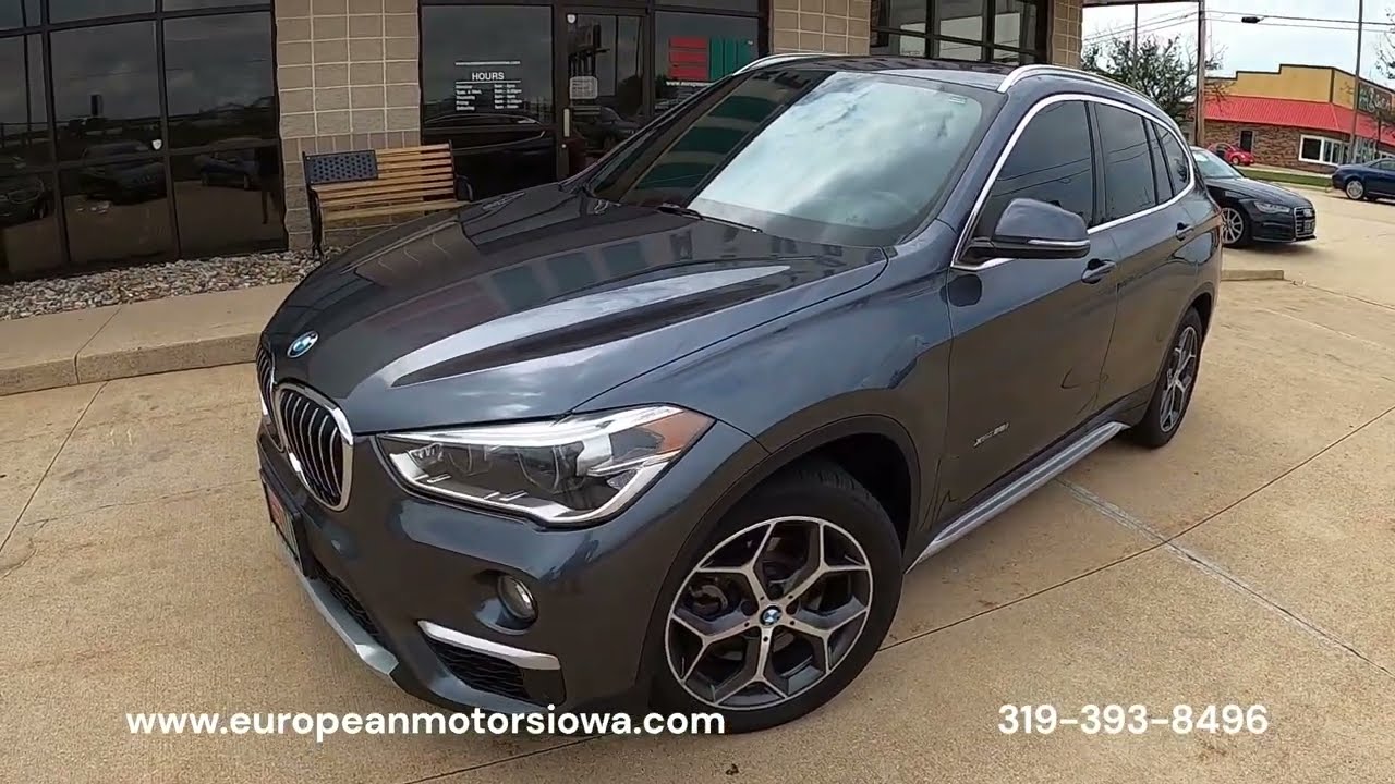 BMW X1 xDrive28i AWD 2018 года выпуска, серый цвет.