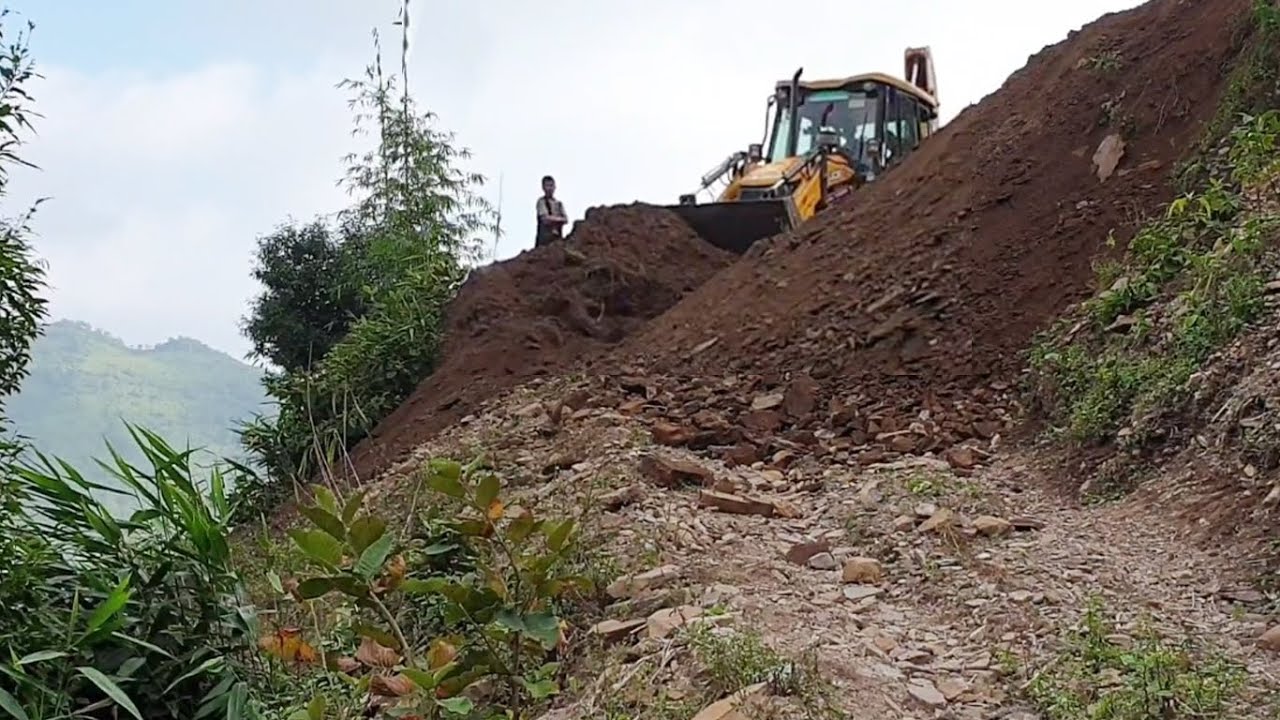 JCB Backhoe Loader-Working on Hill-Road Construction for Hilly Villagers