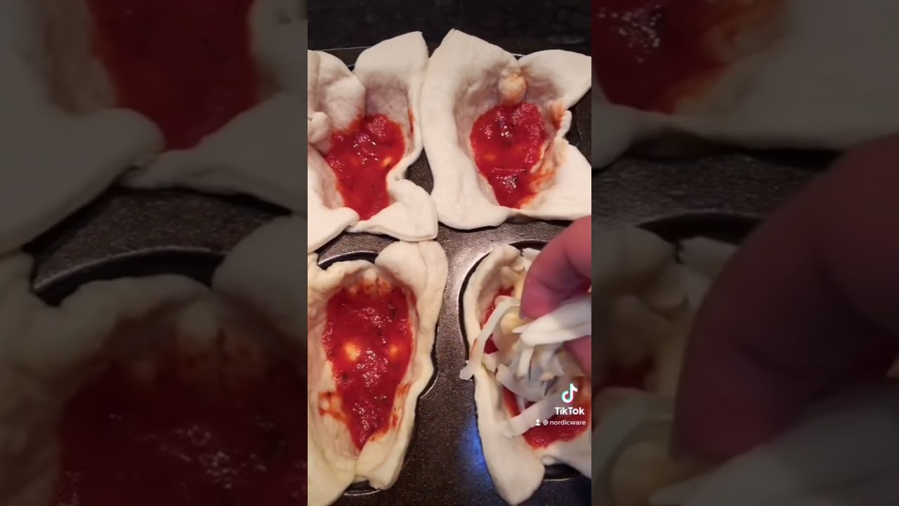 Cheesy Pizza Skulls for Halloween using our Skull Cakelet Pan- Nordic Ware