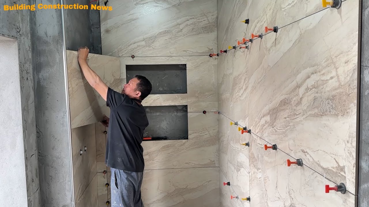 How Experts Install Faux Stone Ceramic Tiles For Modern And Professional Bathroom Walls