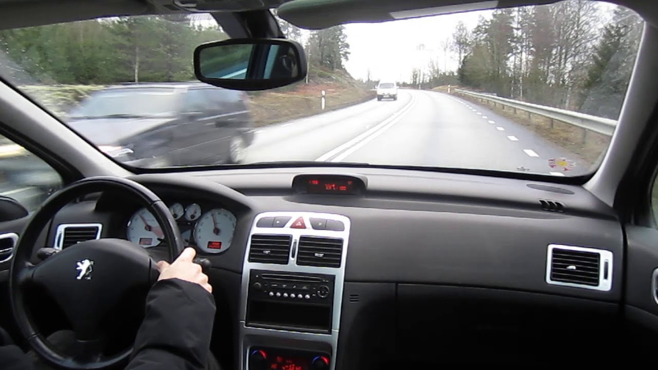 Driving  a Peugeot 307 SW 2007 2.0i
