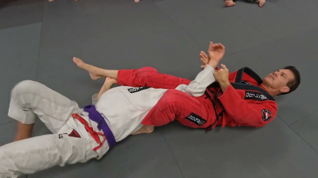 Play on top with knee on belly