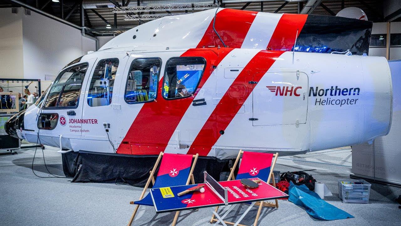 Mit dem Heli in die Messehalle