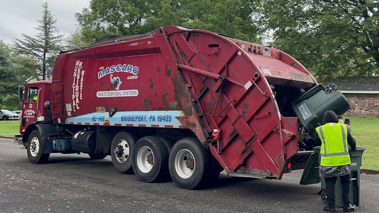 JP Mascaro Mack MR McNeilus rear loader garbage truck