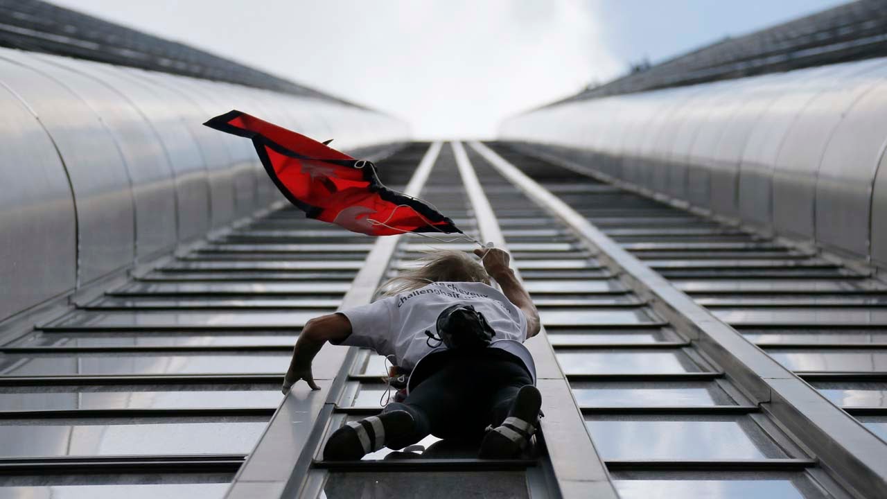 French ‘Spiderman’ Alain Robert climbs 689 ft Tower for Nepal Earthquake Victims