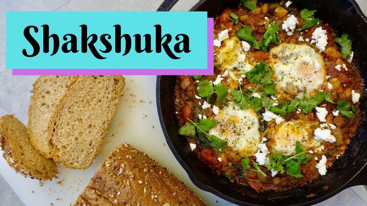 Shakshuka |  Poached eggs with moroccan spiced lamb sausages in tomato sauce!