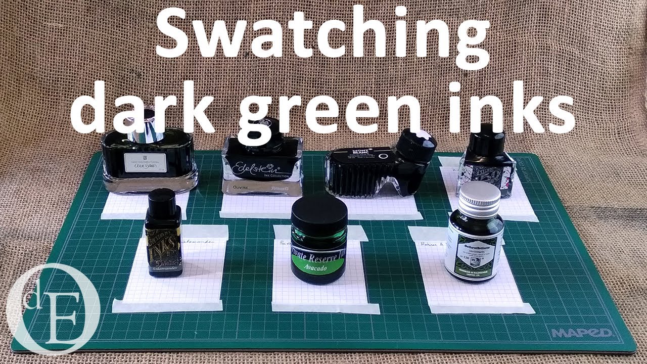 Swatching seven dark green inks