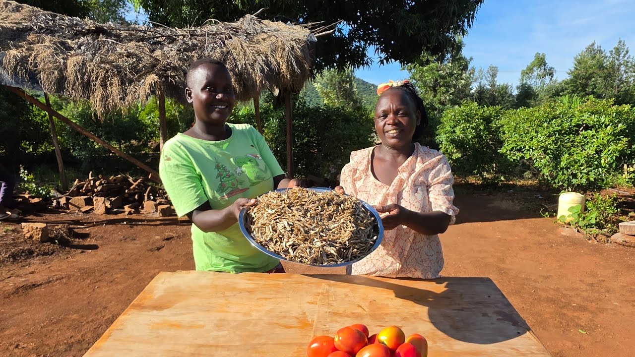 Cooking🔥 100+small fish 🐟 😋 in village life Africa 🌍, ugali  and vegetables 