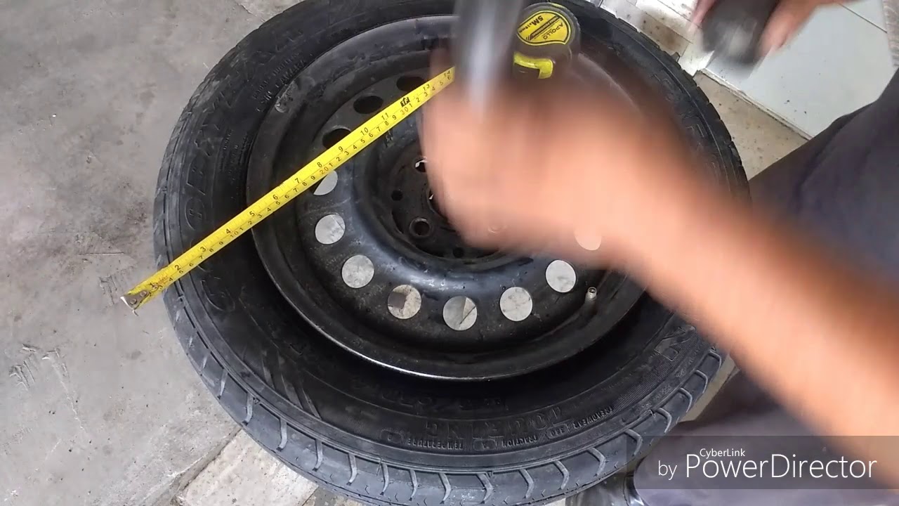 máquina Manuel para pneus de carros.