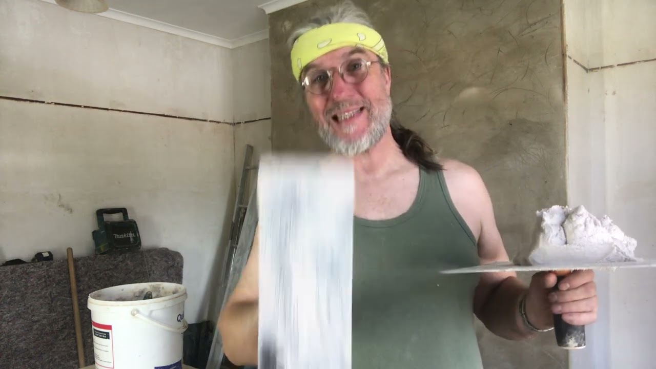 Lime plastering a chimney breast