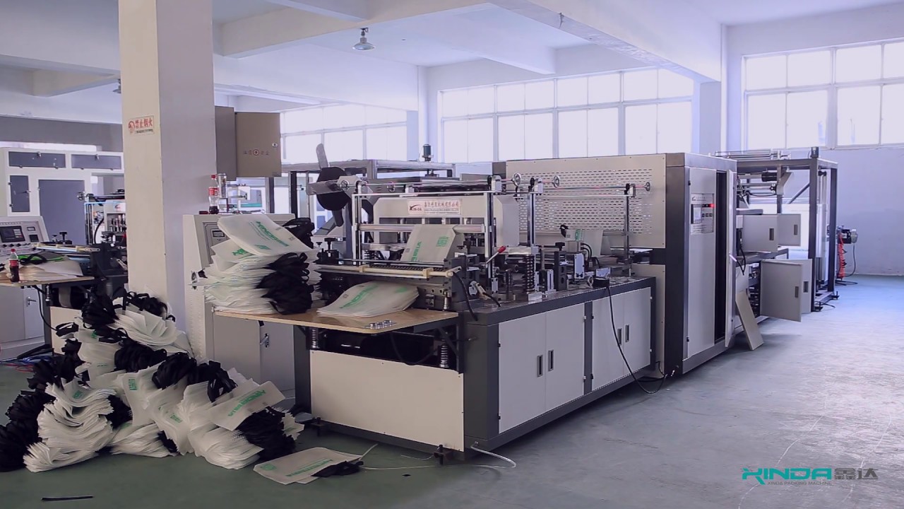 XINDA BRAND AUTOMATIC NON WOVEN BAG MAKING MACHINE WITH ONLINE HANDLE ATTACHING