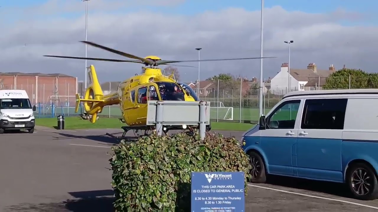 Hampshire and isle of wight air Ambulance (G-BZRS) Landing at St Vincent College 