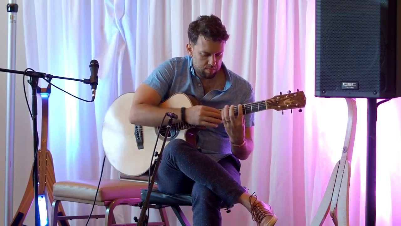 Justin King Playing Kalavinka guitar at the SBAIC