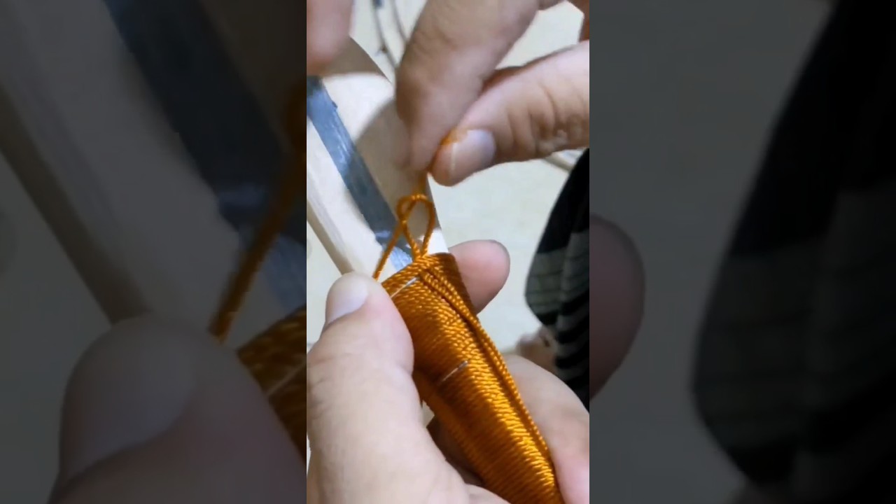 mengikat tali pada busur tradisional 