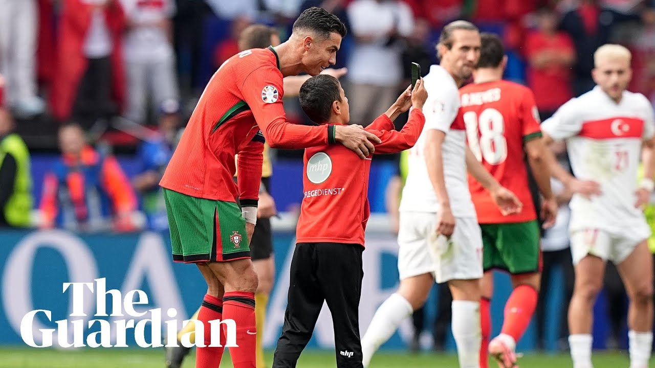 Young pitch invader takes selfie with Ronaldo during Portugal game