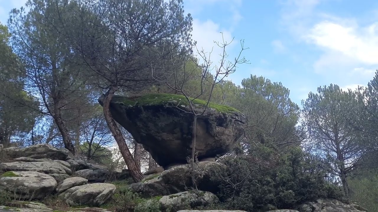 Humming and watching water streaming down the rocks