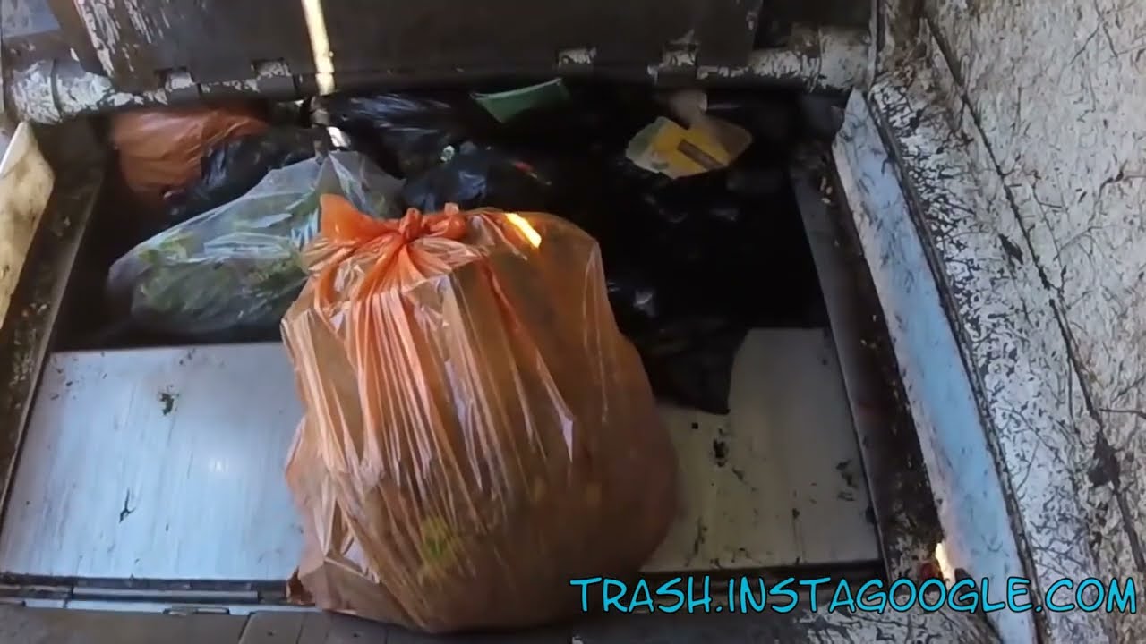 How Garbage Trucks Crush Smelly Trash: An Inside Look