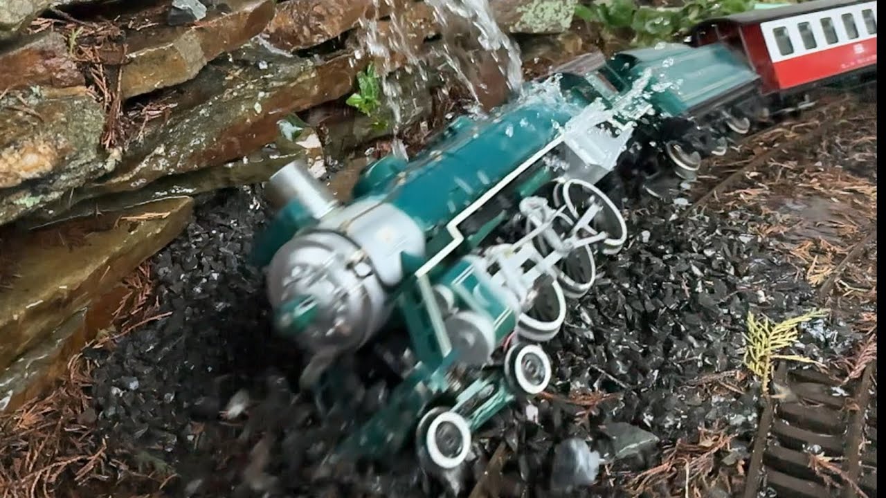 PASSENGER TRAIN CRASHES INTO A ROCK SLIDE