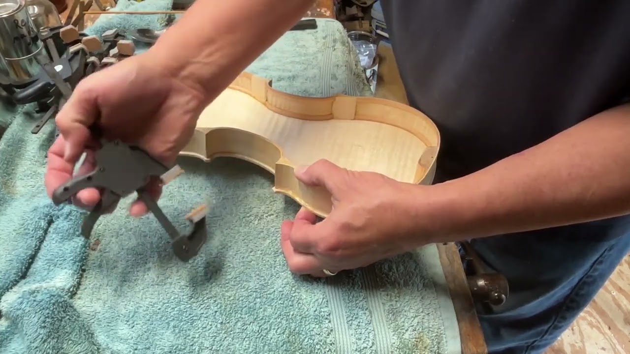 Fixing a glue joint on the back plate.