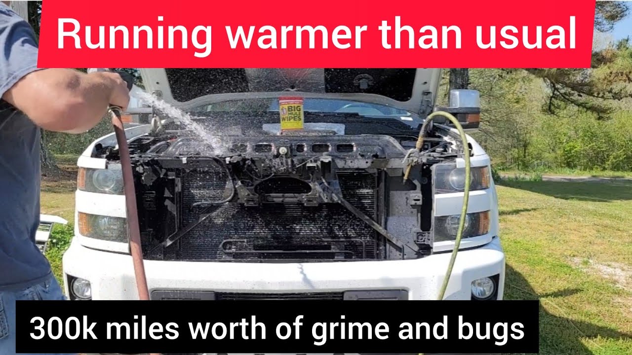 Washing 300k miles of bugs and debris out AC Condenser And Radiator.