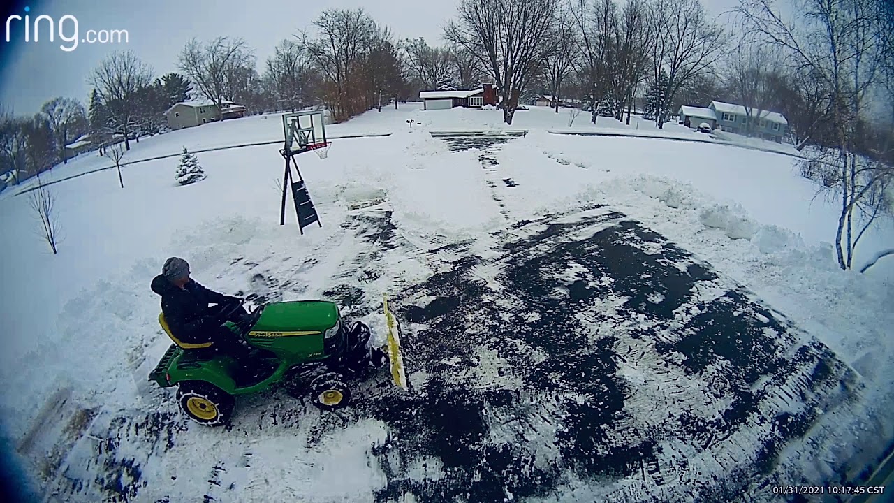 John Deere X744 plowing 8” of wet heavy snow.