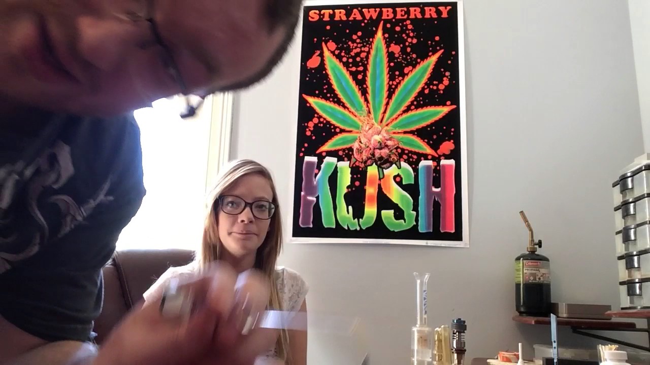 Girl taking fat dab