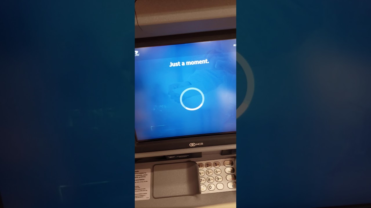 Depositing cash at a Capital One ATM at target store