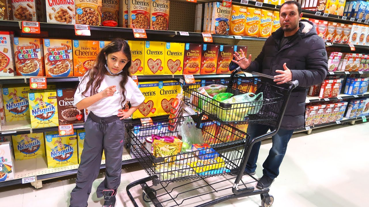 Heidi and Zidane go shopping for healthy food at the supermarket