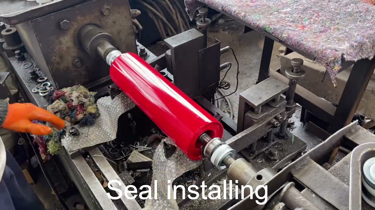 The installing of bearing house seals for conveyor idler roller