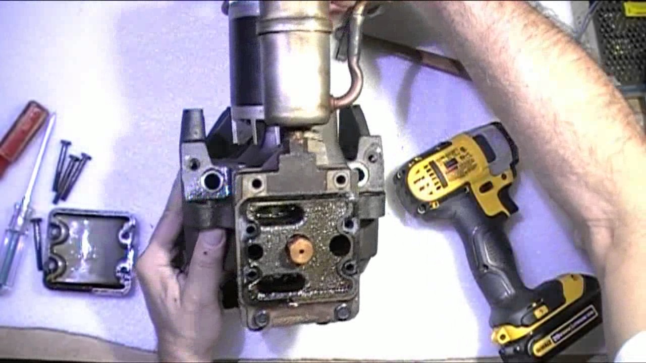 داخل كباس جهاز تكيف       Inside a Hermetic Compressor