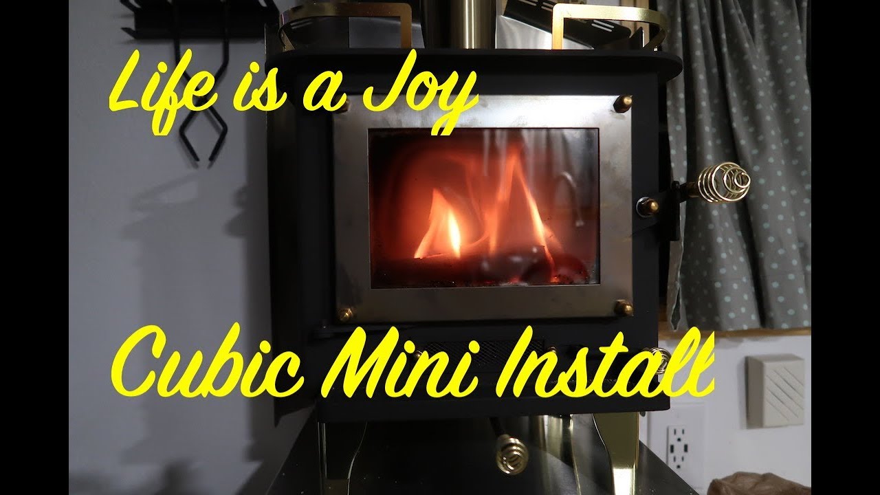 Bus Conversion to Motor Home #171 Wood Stove installation, Cubic Mini (Grizzly)
