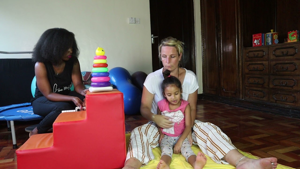 Exercises to improve standing for kids with delayed developmental milestones #PediatricPhysioTherapy