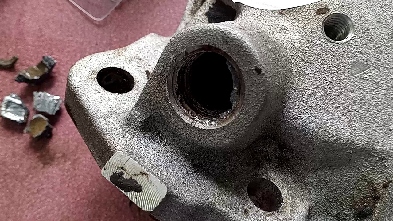 Broken heater hose connector on intake repair
