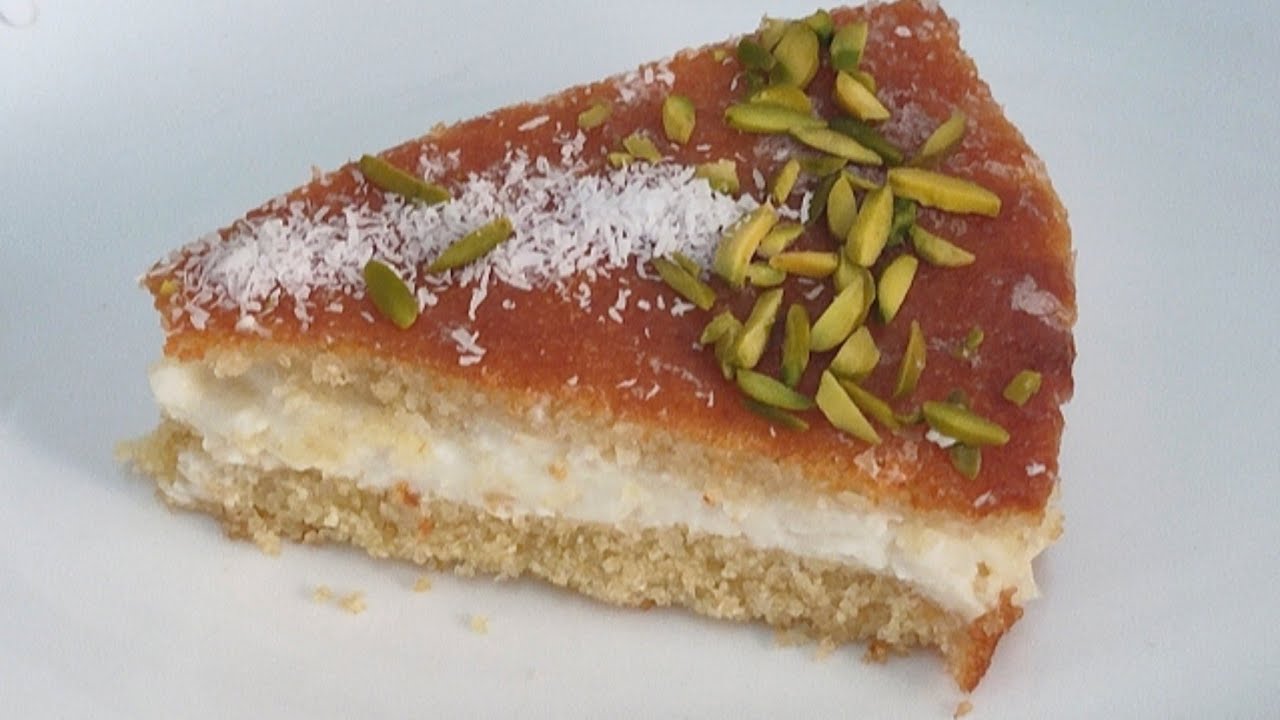 بسبوسة بالقشطة وجوز الهند من اطيب الوصفات